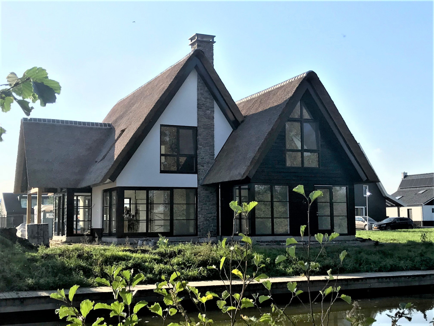 villa riet gedekt, Flagstone, rietenkap, huis bouwen